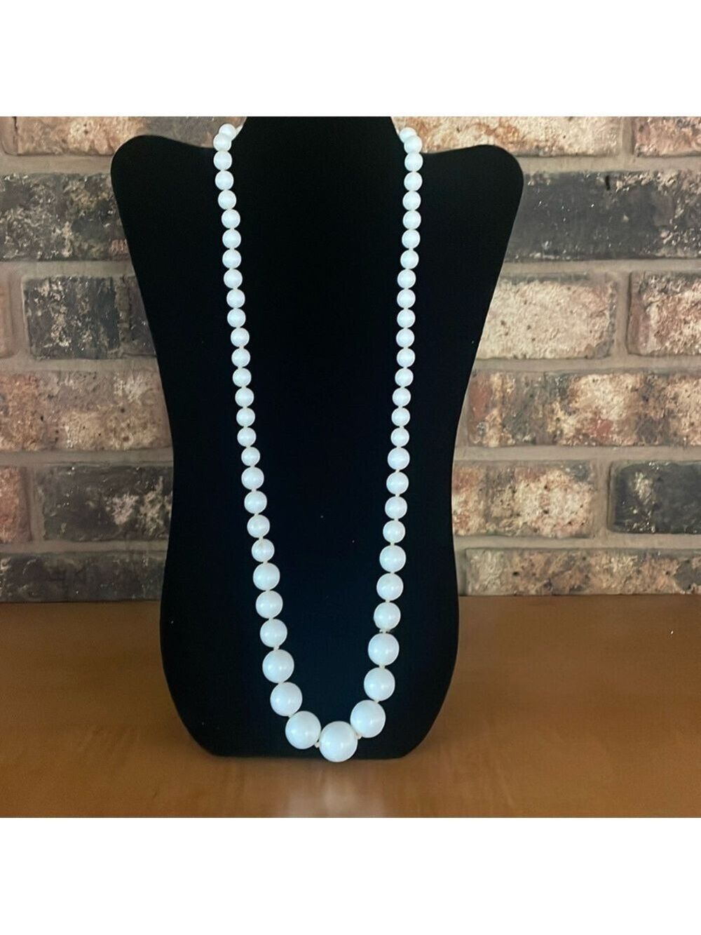 Vintage knotted graduated white faux pearl necklace